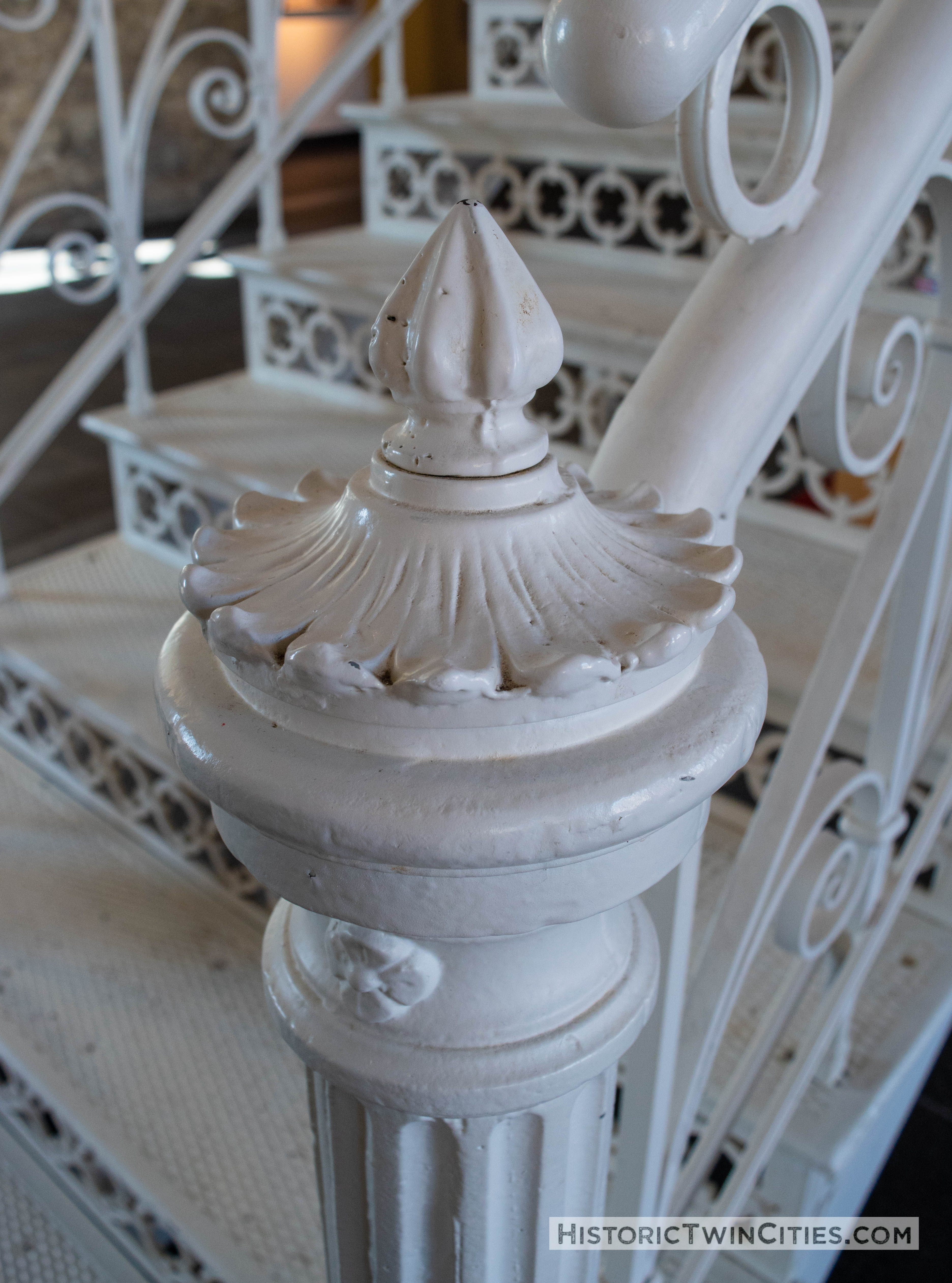 Ornate iron newel post located on the ground floor of the Grain Belt brew house