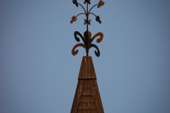 Weather vane on top of the clock tower of Old Main Hall at Hamline University