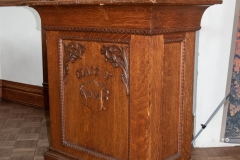 Podium on the stage in Bridgman Hall that reads "Class of 1933"