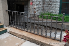 Ironwork leading to the lower level of Old Main Hall at Hamline University