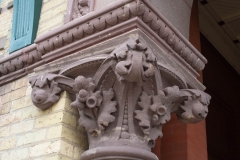 Corinthian capital topping the left column at the entrance to Old Main Hall