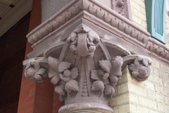 Corinthian capital topping the right column at the entrance to Old Main Hall