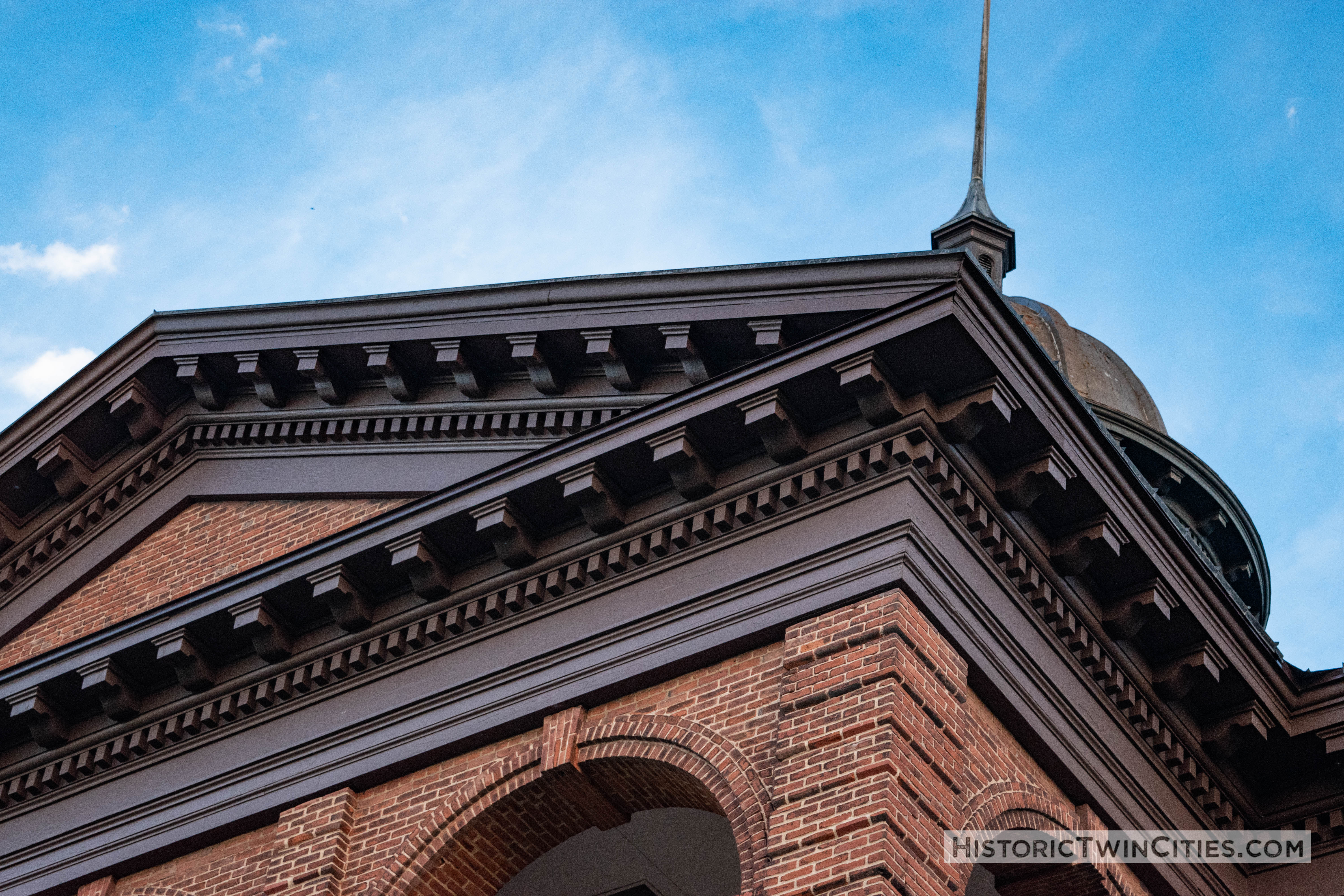 Ornate corbels and dentils adorning the cornice of the Historic Washington County Courthouse - Stillwater, MN