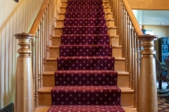 Stairway leading from the first floor to the second floor courtroom of the Historic Washington County Courthouse - Stillwater, MN