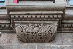 Ornately carved grotesques in the stonework on the exterior walls of the Landmark Center in St. Paul, MN