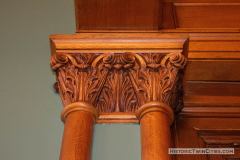 Carved capitols atop wooden columns in the Ramsey County Room (Courtroom 317) in the Landmark Center in St. Paul, MN