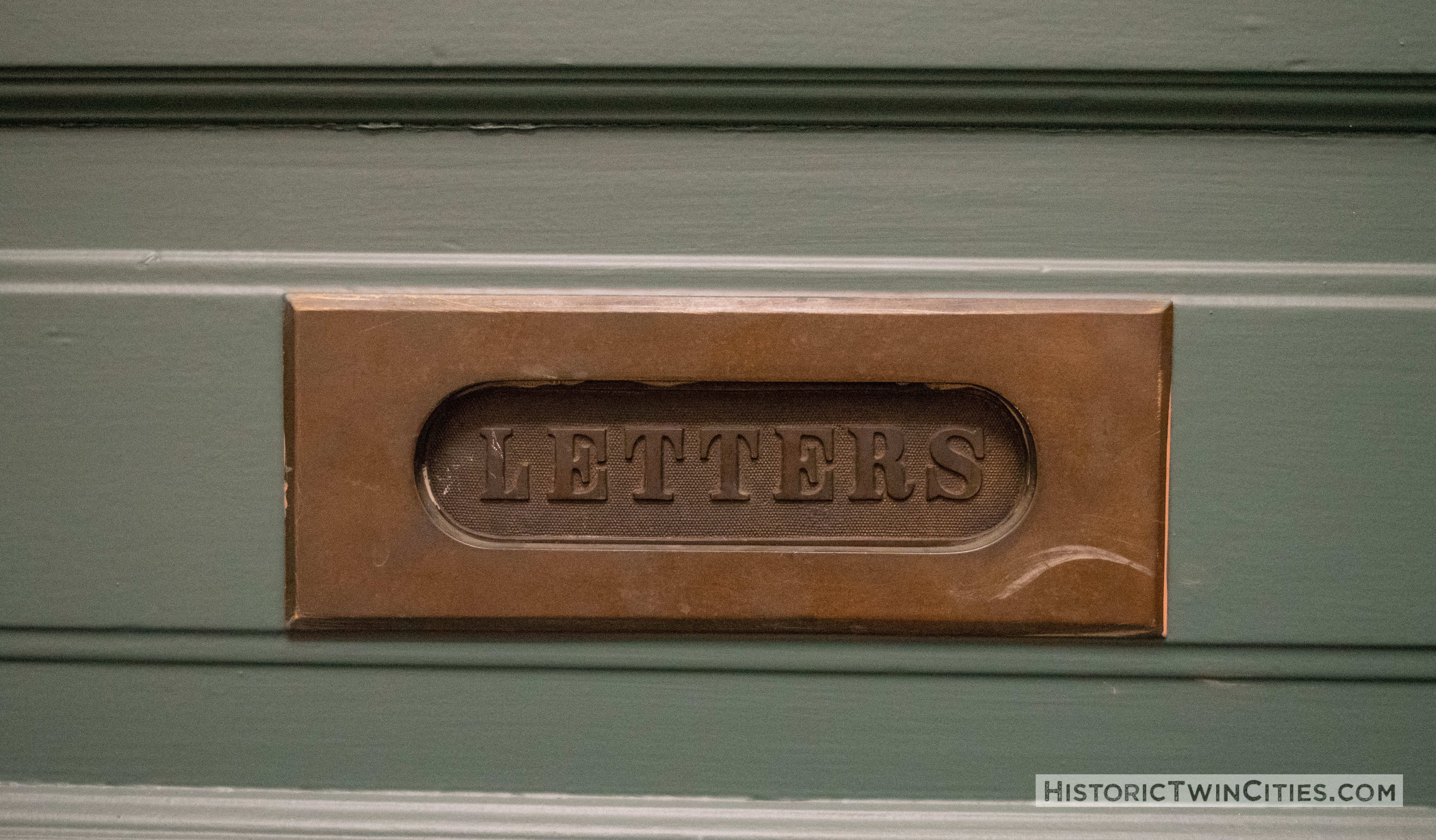 Mail slot in door inside Pillsbury Hall - University of Minnesota
