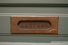 Mail slot in door inside Pillsbury Hall - University of Minnesota