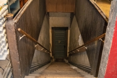 Stairway leading from the attic down to the third floor of Pillsbury Hall - University of Minnesota