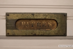 Mail slot in door inside Pillsbury Hall - University of Minnesota