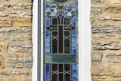 Stained glass window on the Historic Church of St. Peter in Mendota