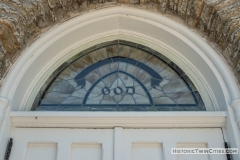 Stained glass window above the entrance to the Historic Church of St. Peter in Mendota
